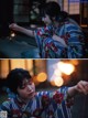 A woman in a kimono holding a sparkler.